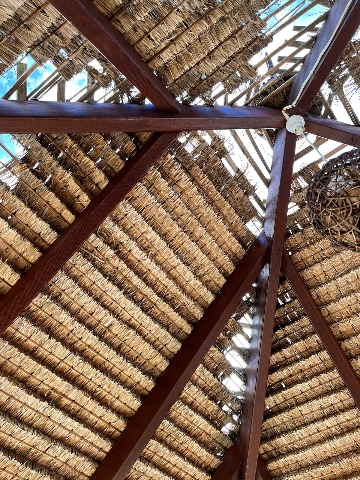 Reroofing your worn Bali hut roof
