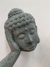 Resting Buddha head on Arm