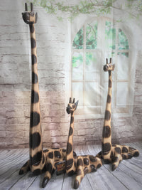 Hand carved Laying Giraffe Statue